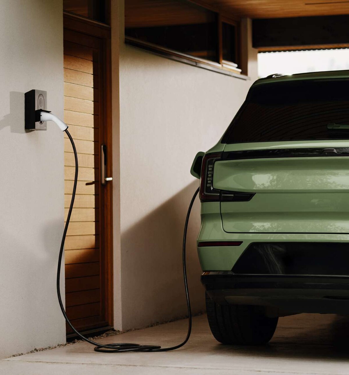 EV charging from a wall charger at a home carport
